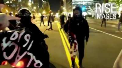 Woman armed with knife gets knocked out after allegedly stealing flag - Washington, DC 14th November