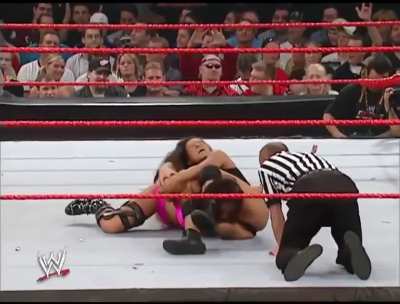 Gail Kim with a christo and later, a headscissors takedown counter