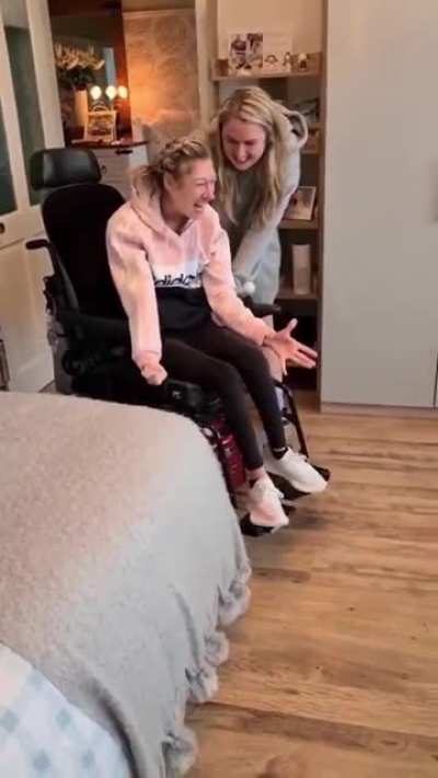 Friends arrange to get a Car simulator for a young lady with Cerebral Palsy that loves car racing games