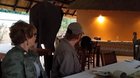 Terrifying moments for American tourists in Zambia when a herd of elephants shows up as they’re having their breakfast