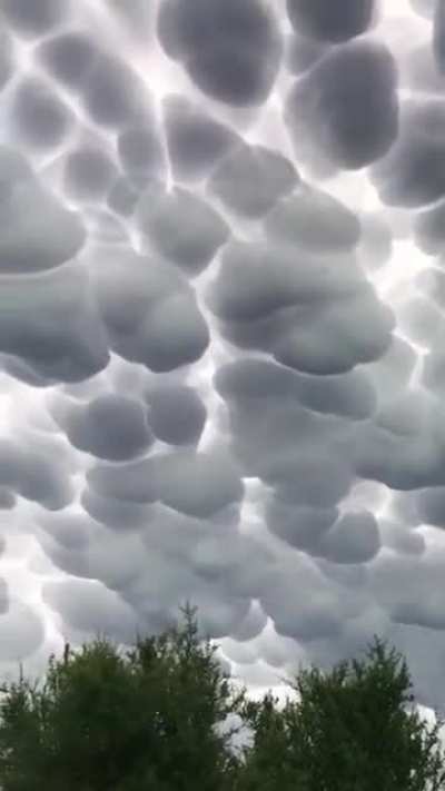 Mammatus clouds forming after a tornado
