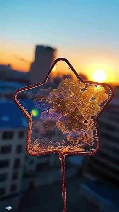 Thin film of soapy water freezing at -30°C.