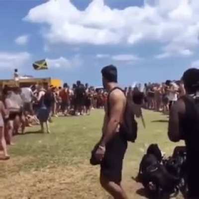 This idiot doing flips almost hitting a rock