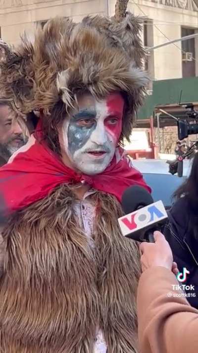 Q is a psyops says this guy in Manhattan today