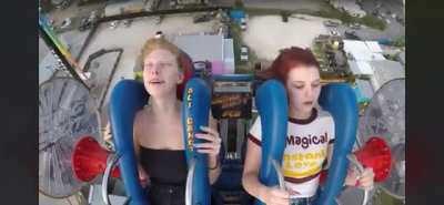 Girl passes out multiple times on sling shot ride