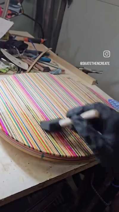 I made a top out of plywood and recycled skateboards