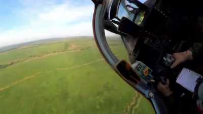 Cockpit POV of Russian Su-25 conducting a rocket attack on enemy positions