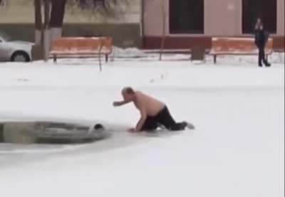 Man saves dog from ice cold pond