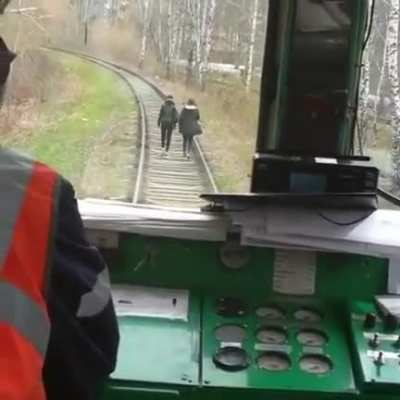 Walking on the train tracks.