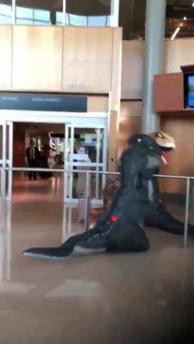 Kids greet their mom at the airport