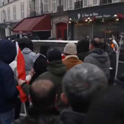 Protesters destroying roads and cars after Paris killings