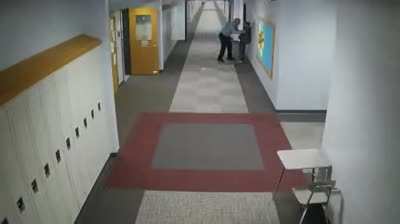 Teacher hits student for walking out of class.