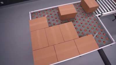 Smart conveyor system can move and spin objects in multiple directions