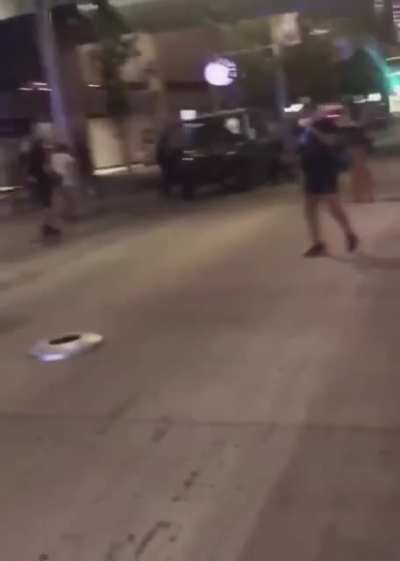Protester follows police instructions to surrender their shield