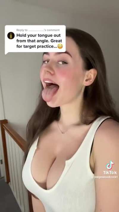 With her tongue out