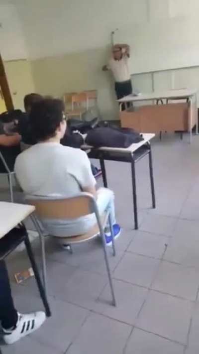 “Class clown” throws bin at teacher