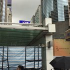 Protesters encouraging man not to jump off the building