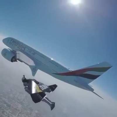Flying next to a plane at an flight altitude of 3900 feet and at a speed of 195 mph