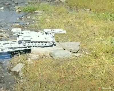 A Lego bridge layer tank in action