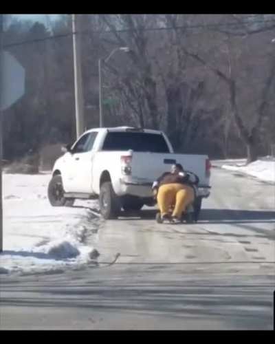Woman is towed in Kansas City