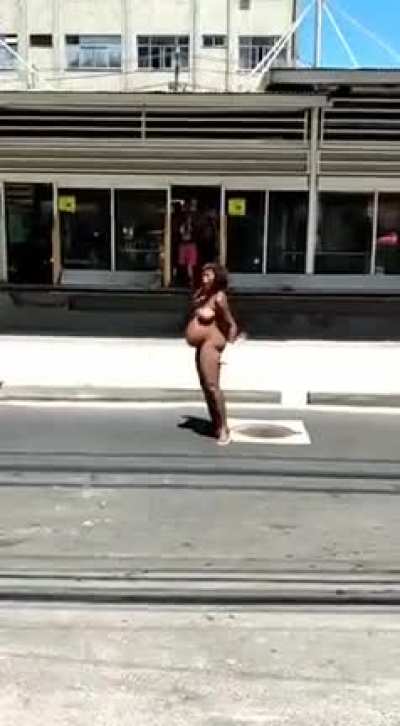 Pregnant naked crackhead gets into a argument in madureira, rio de janeiro. As people stand by and laugh