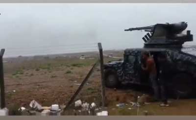 Iraqi police Humvee with 2A7 23mm