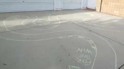 How this guy deals with kids playing on his driveway.