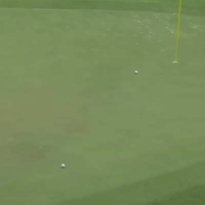 Epic hole-in-one while skipping the ball over water