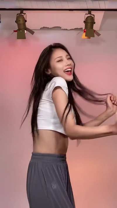 Cute Asian girl feeling the rhythm