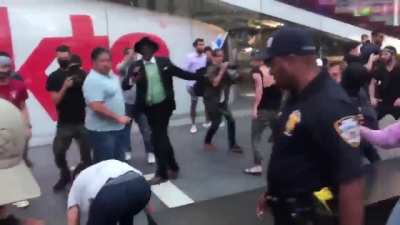 Pro Israel and Pro Palestine protesters brawl in Times Square.