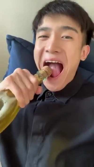 Opening champagne with your teeth.