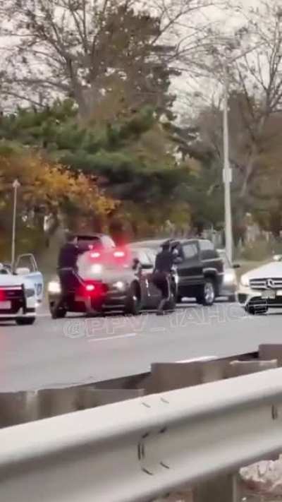 NYPD shoot at the driver of a car that hit a cop car and the driver pulled a gun