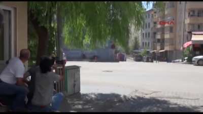 Turkish Police Sniper kills 2 armed pkk terrorist who preparing to attack Police Station in the crowd