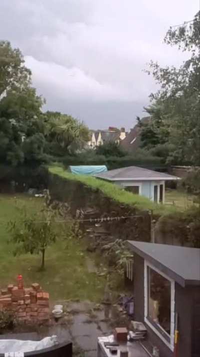 I was trying to capture lightning in slow motion when I caught this.