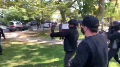Philadelphia protesters confront James Klug; an anti-trump protester hits the ground next to Klug, the crowd thinks he's with Klug so they proceed to call him a nazi, threaten him, attack him, and smash up his car.