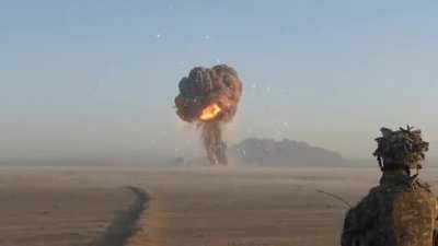 Visible delayed shock-wave from bomb.