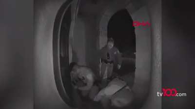 Police beating a boy who ran a red light at the door of his house. He is crying 