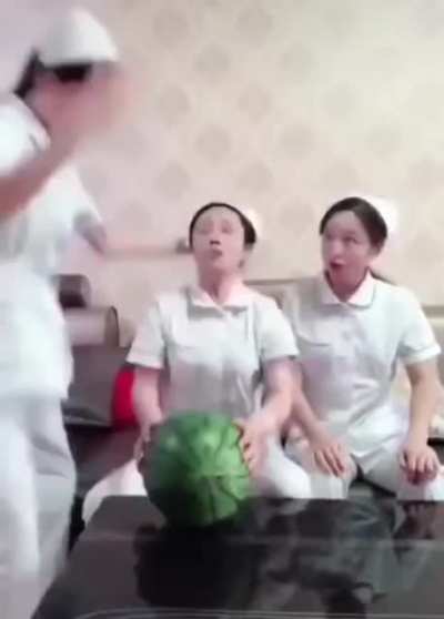 Nurse chop open watermelon..