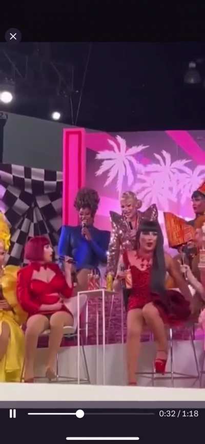 further context on the q and plane drag con drama