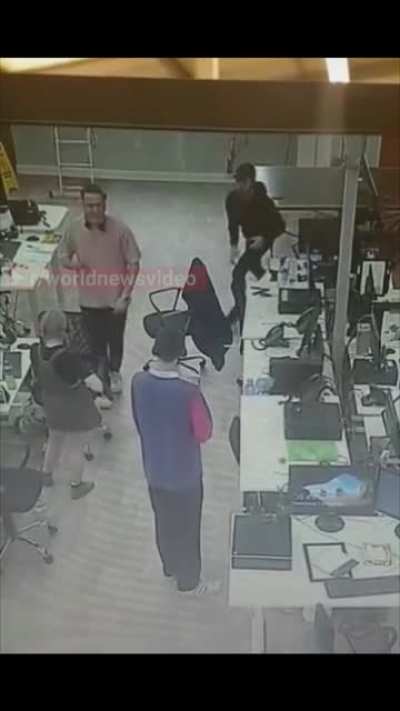 Man recognizes a woman having a seizure and catches her before she hits the ground
