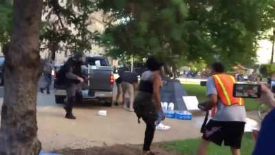 Cops steal protesters' water and dump milk