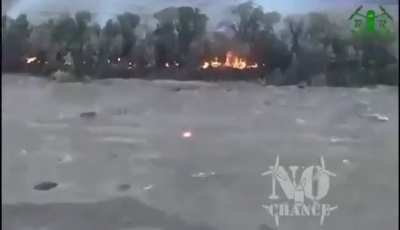 Ukrainian drone pours out burning napalm on treeline with russians, Ukrain summer 2024