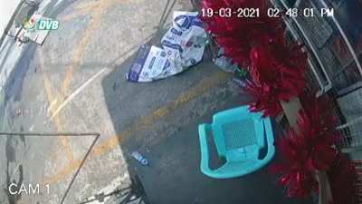 Military/police stealing/looting beer and drinks from a shop.