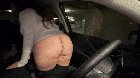 Twerking her bare ass in a car