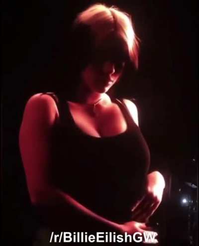 Putting her massive tits on display