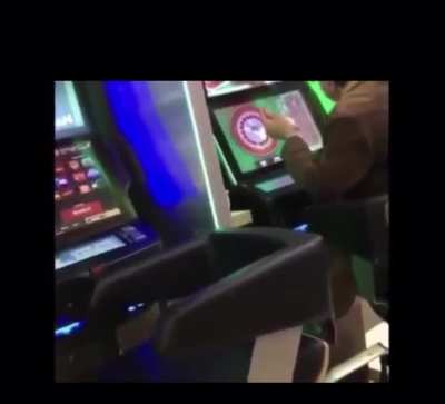 Asian man spreads holiday cheer by attacking a slot machine and screaming fuck God, Fuck Jesus, fuck Christmas...