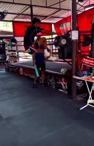Thai dude practicing jumping knees and kicks in Phuket.