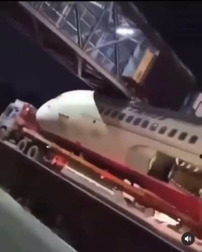 Aircraft fuselage being transported