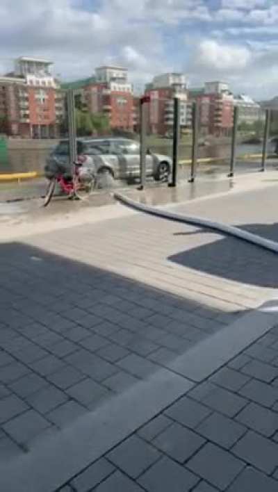 Skateboarder thinks it’s a good idea to ride over a hose pipe
