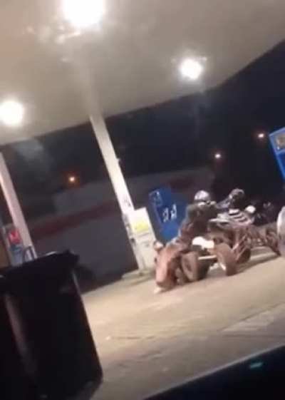 Two police officers trying desperately to apprehend an ATV driver, but he's determined to get away